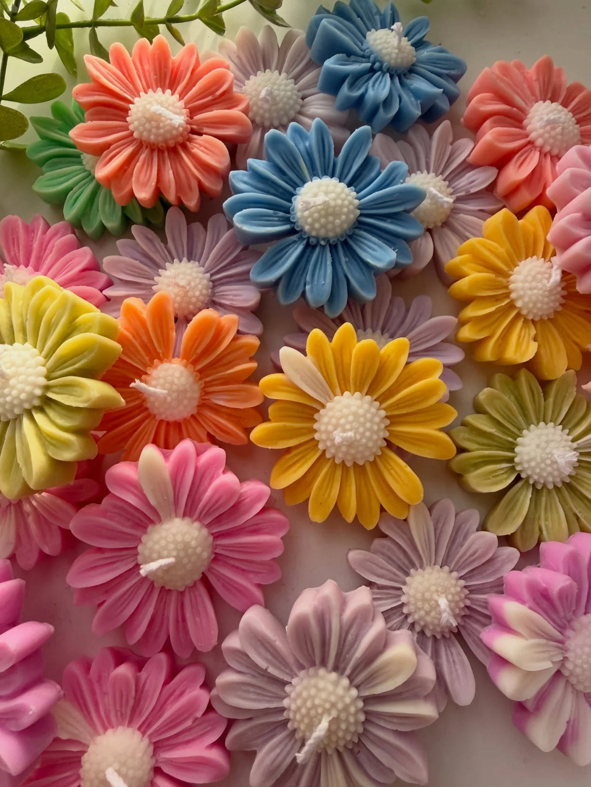 Colorful daisy shaped candles