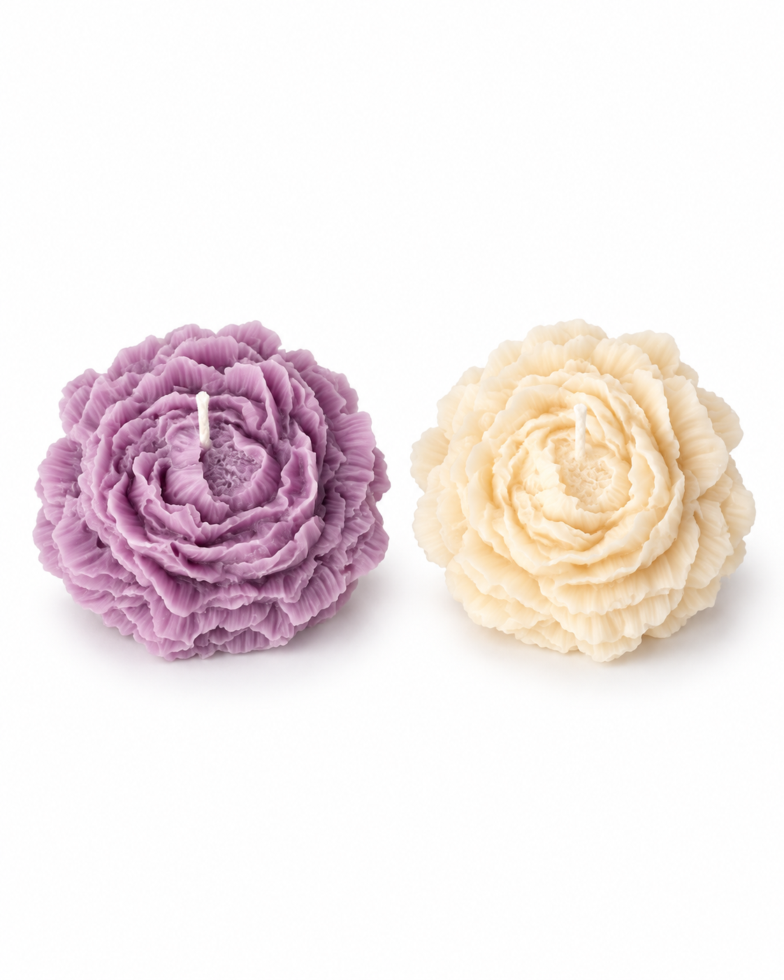 Individual peony shaped candles in lilac and ivory