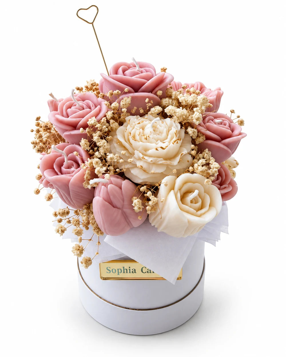 Pink and ivory rose candles in a round box