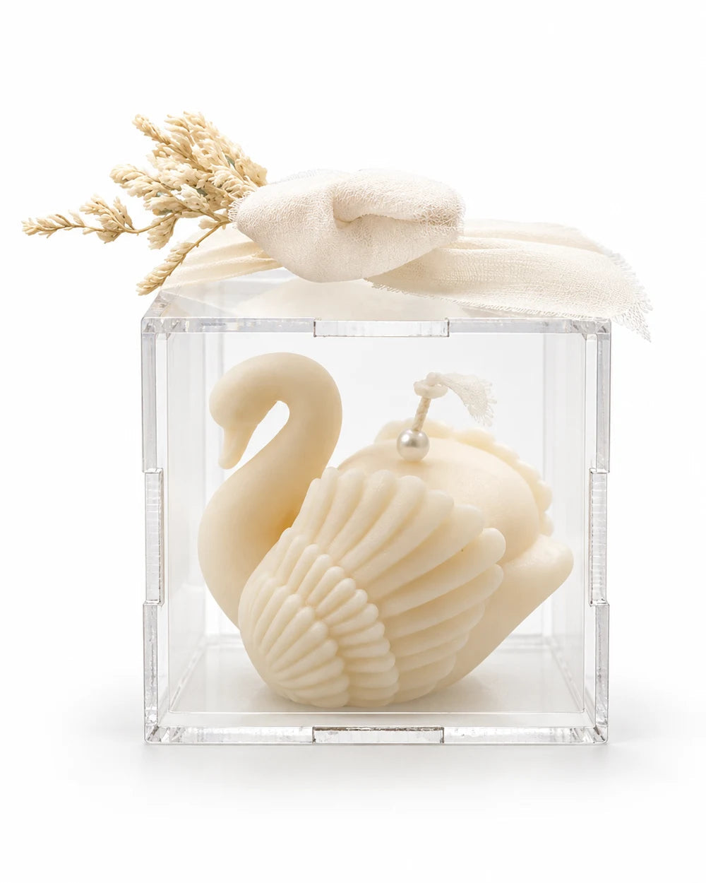 White swan candle favor in a clear acrylic box